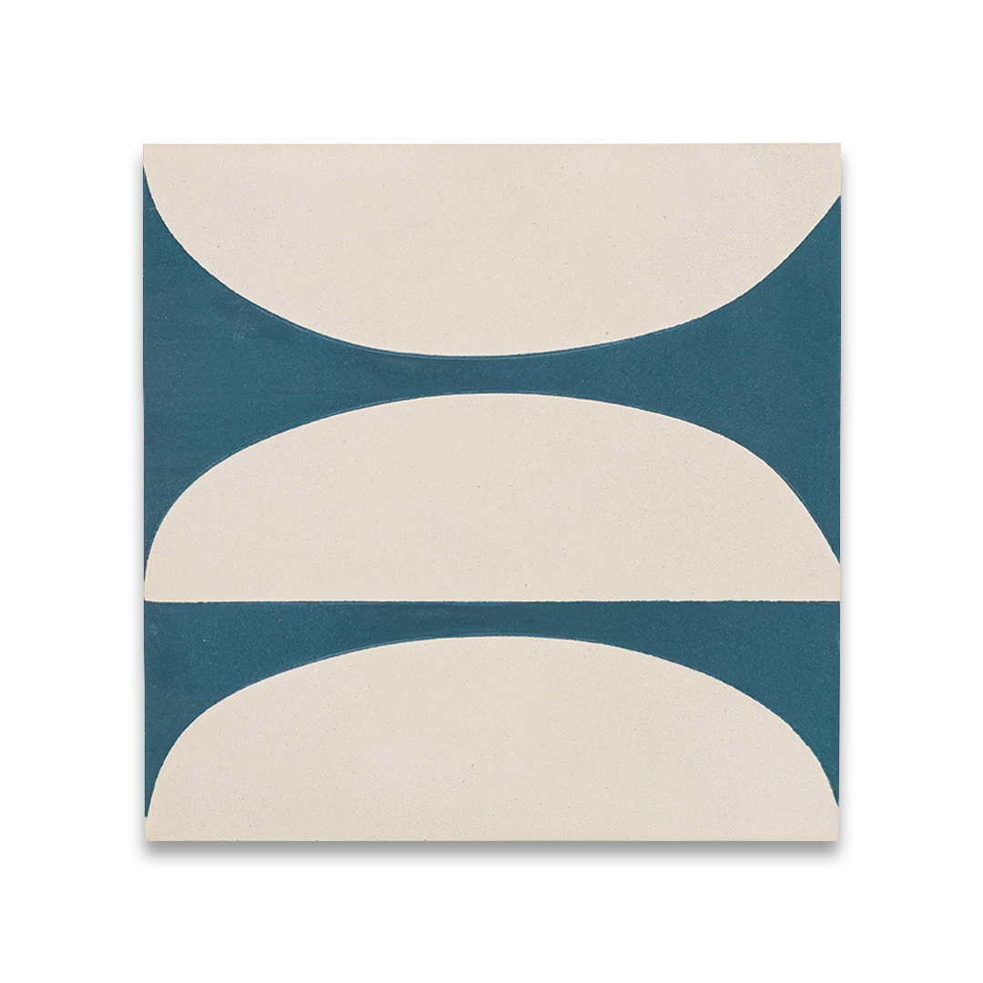 Square blue cement tile featuring abstract geometric white semicircles and circular patterns with a matte finish, ideal for modern flooring, wall cladding, and contemporary interior design applications.