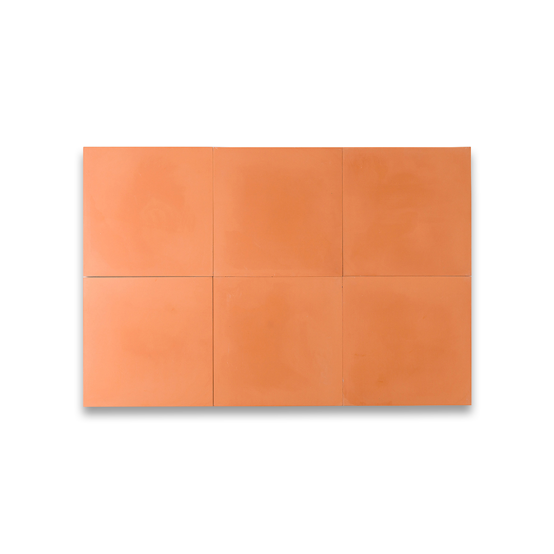 Square cement tile design in solid terracotta orange color with a smooth matte finish, ideal for rustic flooring, wall cladding, patios, or Mediterranean-style interiors.