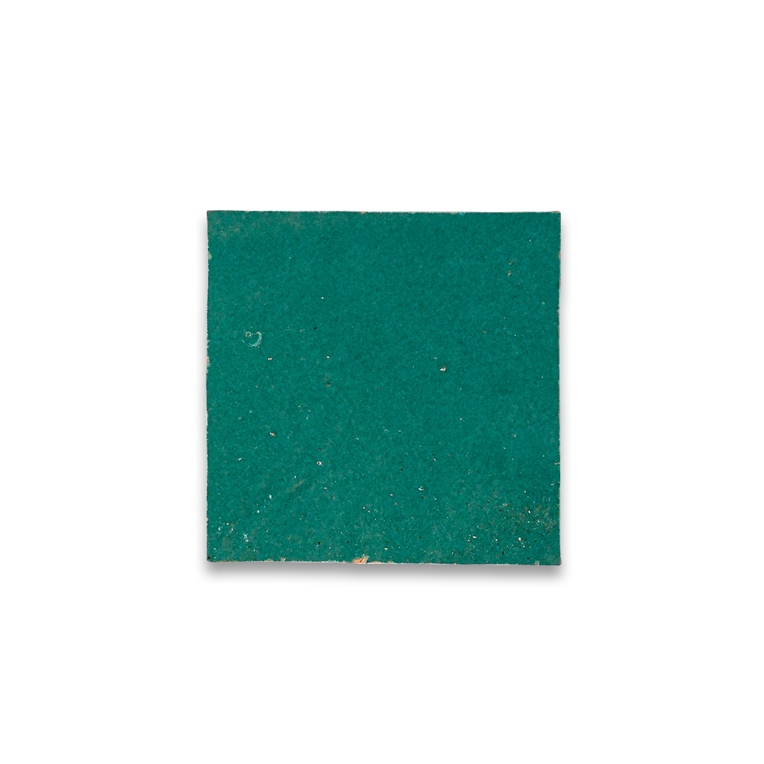 Green square tile on a white background