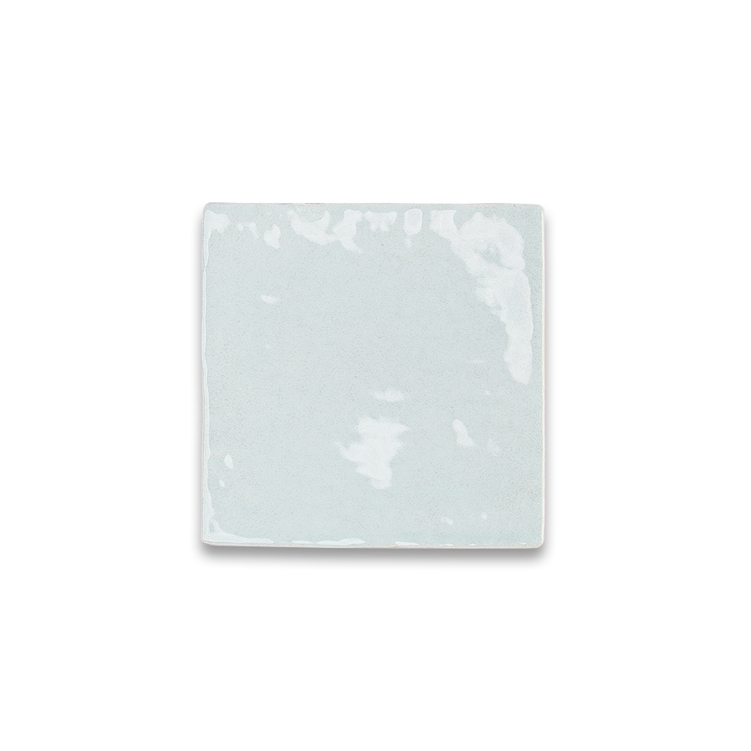  light blue ceramic tiles arranged in a grid pattern on a white background