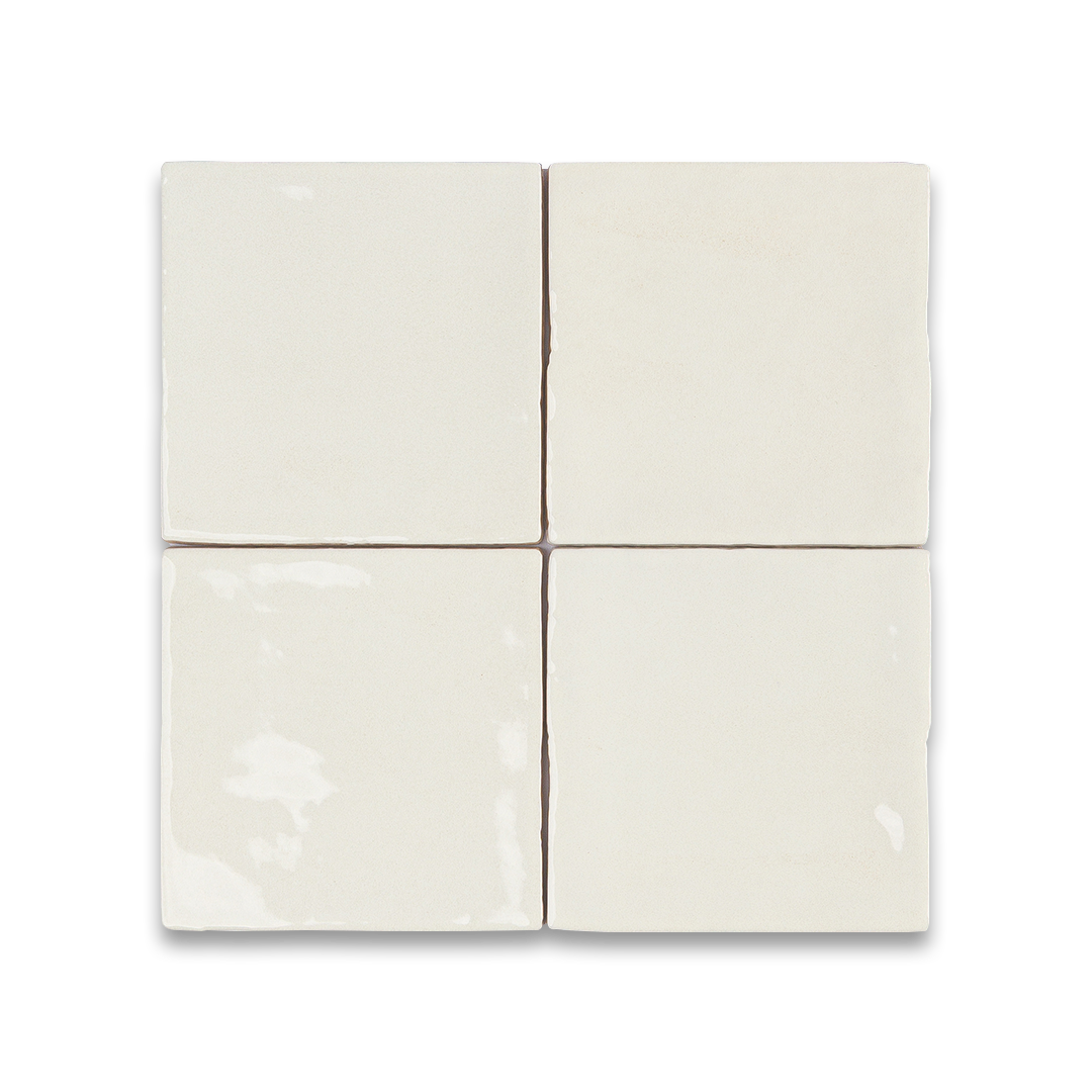 Set of four square tiles on a white background