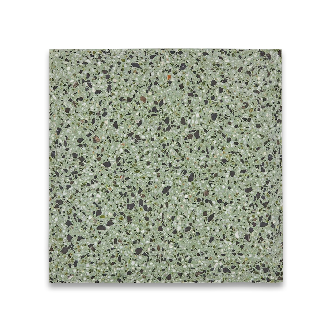 Green terrazzo patterned tile on a white background