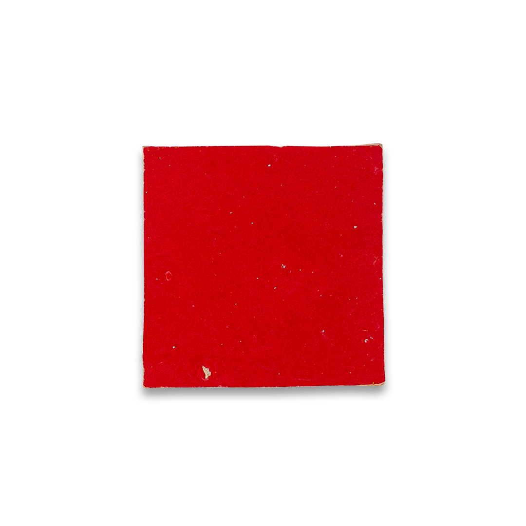 Square piece of red material on a white background