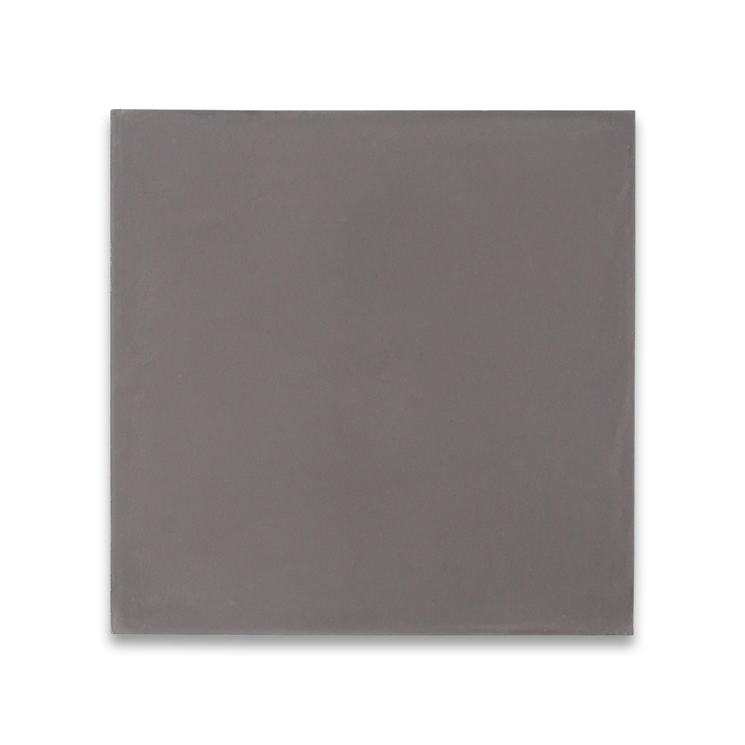 Square ceramic tile in uniform gray with smooth matte finish, minimalist design highlighted against black background.