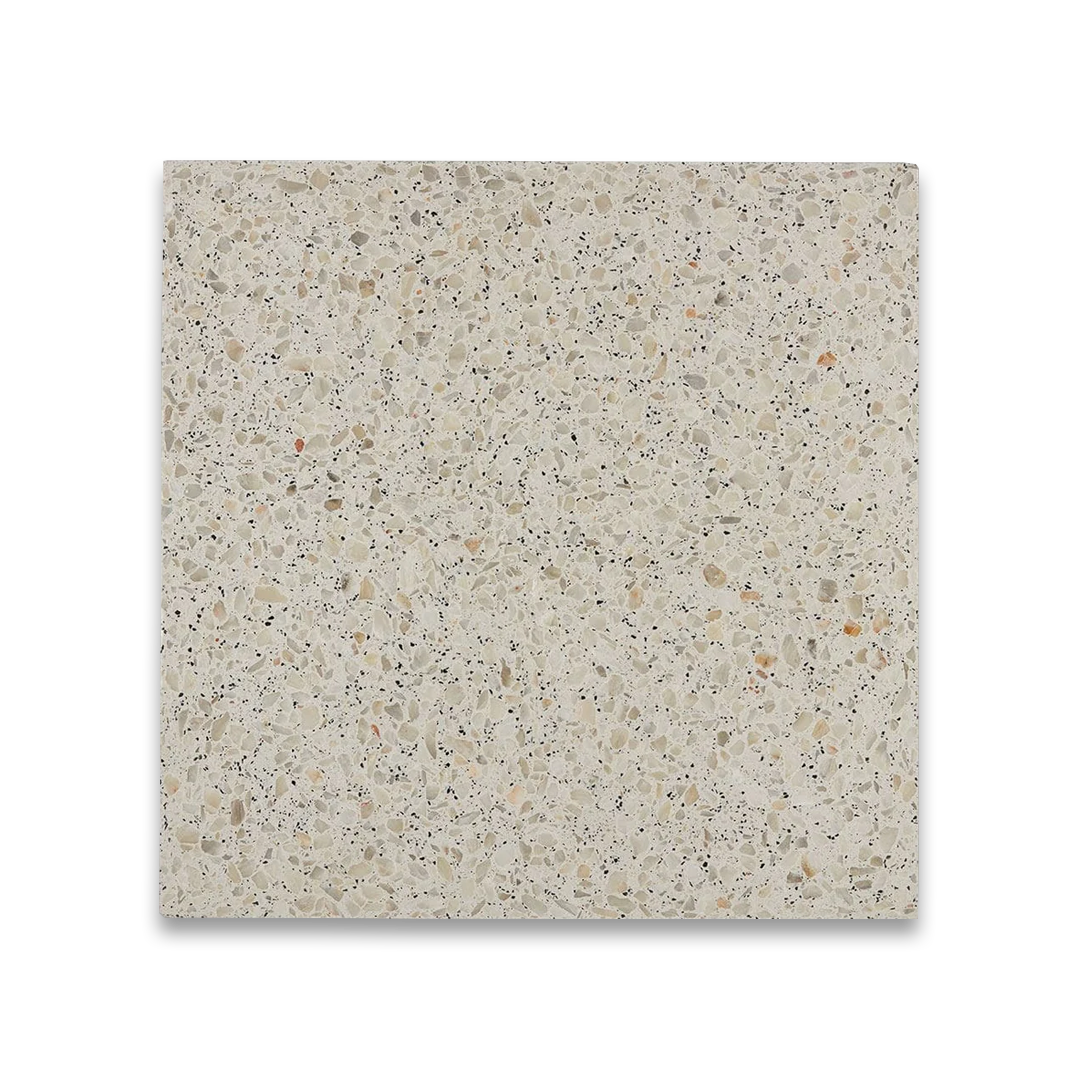 Square tile with a speckled pattern on a white background