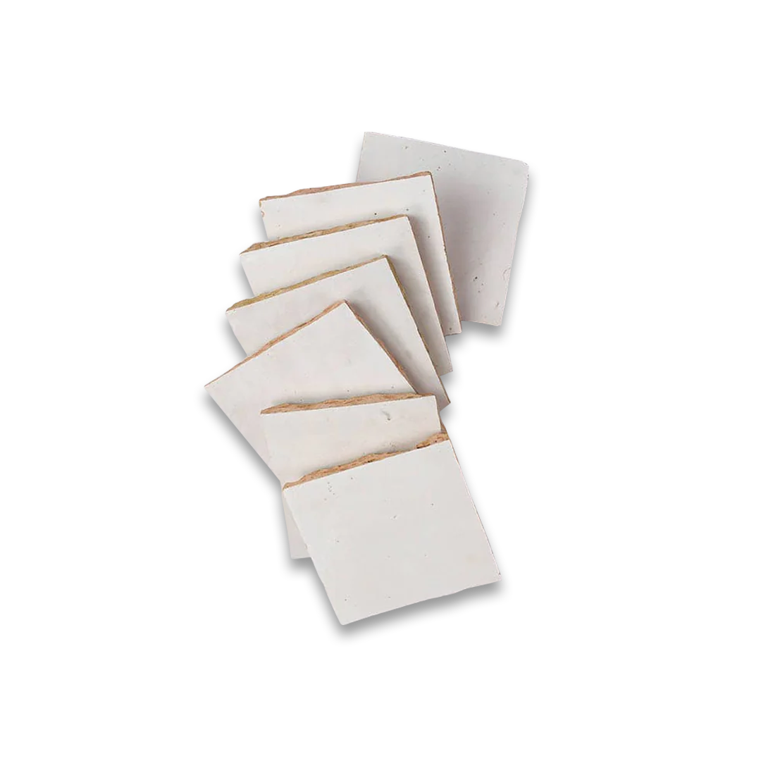 Set of six square ceramic coasters on a white background