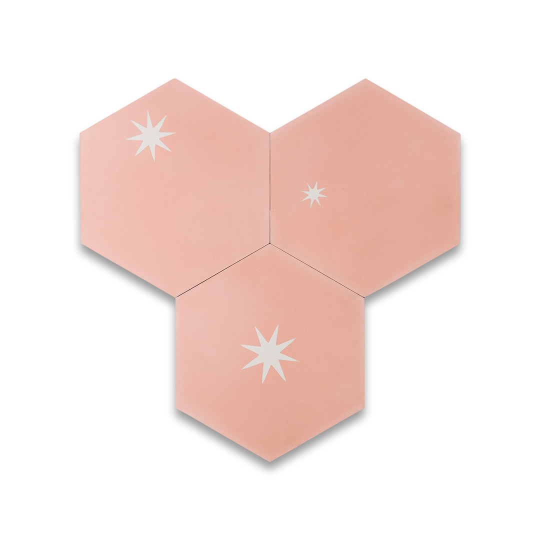 Hexagonal pink tiles with white star designs on a white background