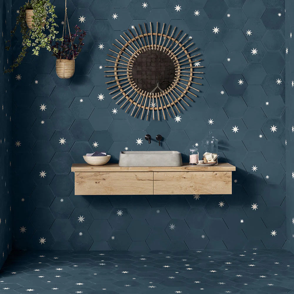 Decorative cement tile design featuring three teal hexagonal tiles with white starburst motifs, arranged in triangular formation, ideal for modern interiors and architectural accents
