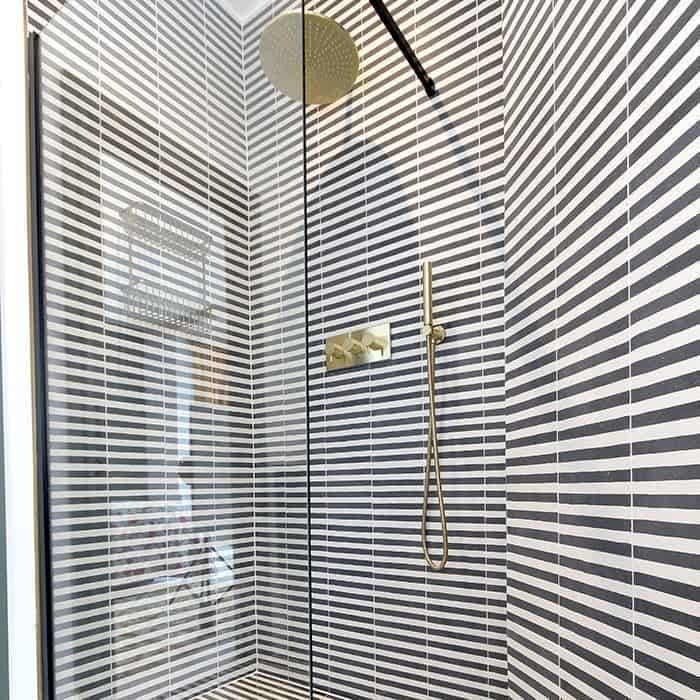 Square green metro cement tile featuring alternating vertical navy blue and white stripes with a matte finish, ideal for modern flooring, wall cladding, and contemporary interior design applications.