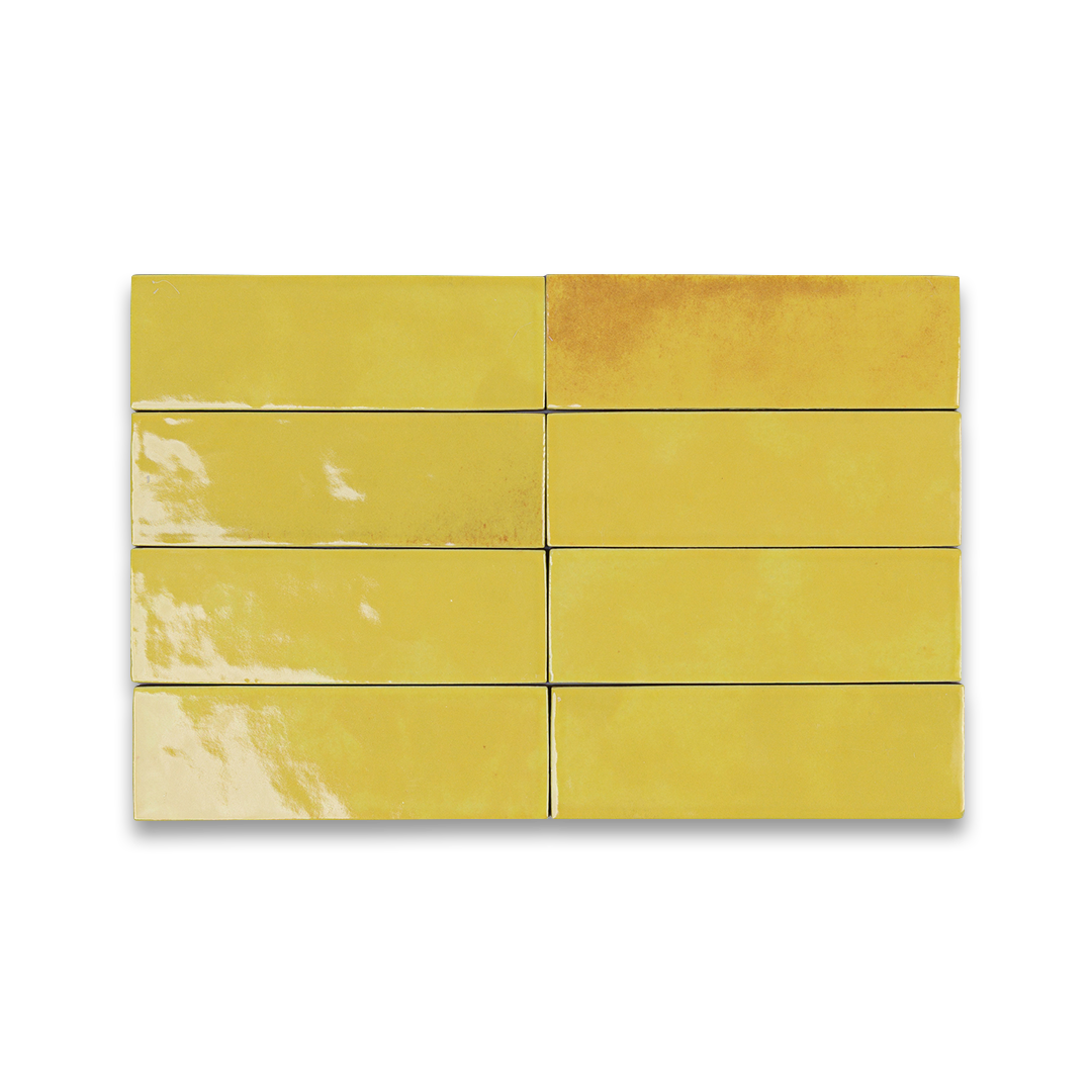 Set of yellow tiles with a marbled pattern on a white background