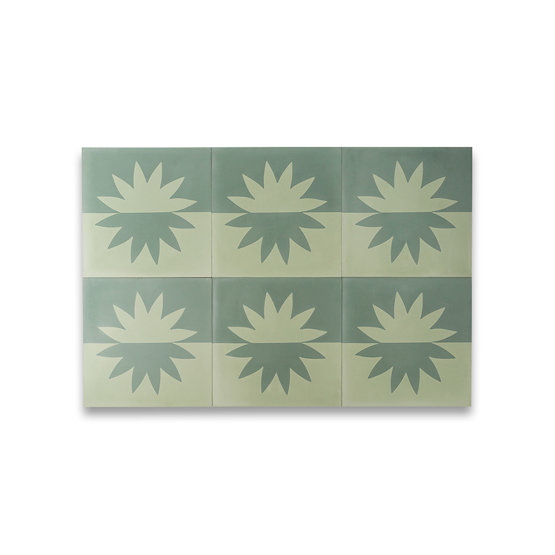 Square cement tile with symmetrical flower-like motif, mirrored across horizontal division in muted greenish-blue and beige, creating a modern minimalist design. 