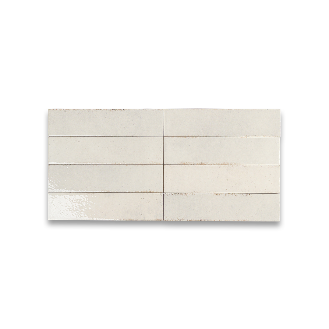 Rectangular ceramic tile with a light beige color on a white background