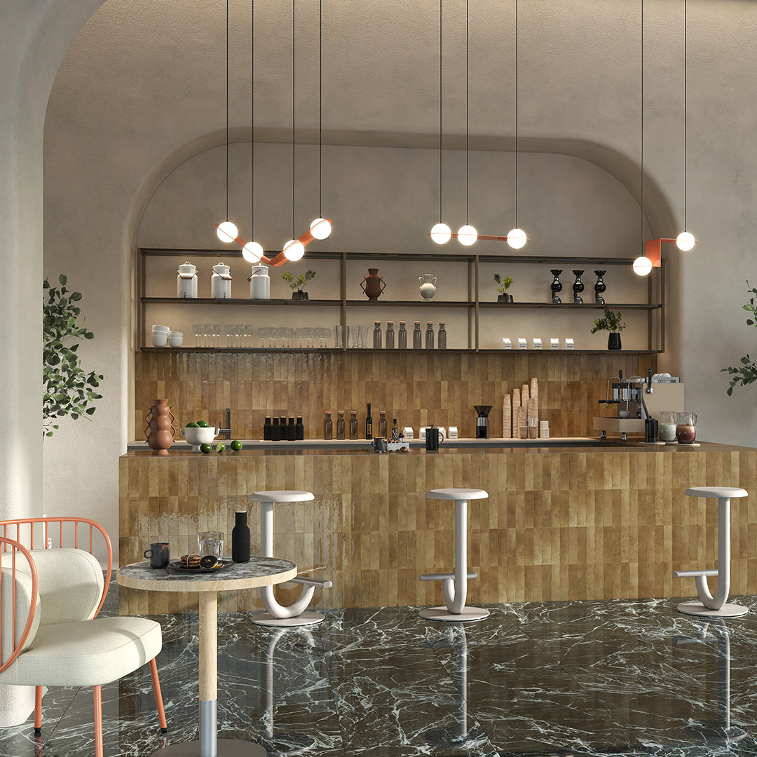 Modern bar interior with wooden counter, stools, and decor elements.