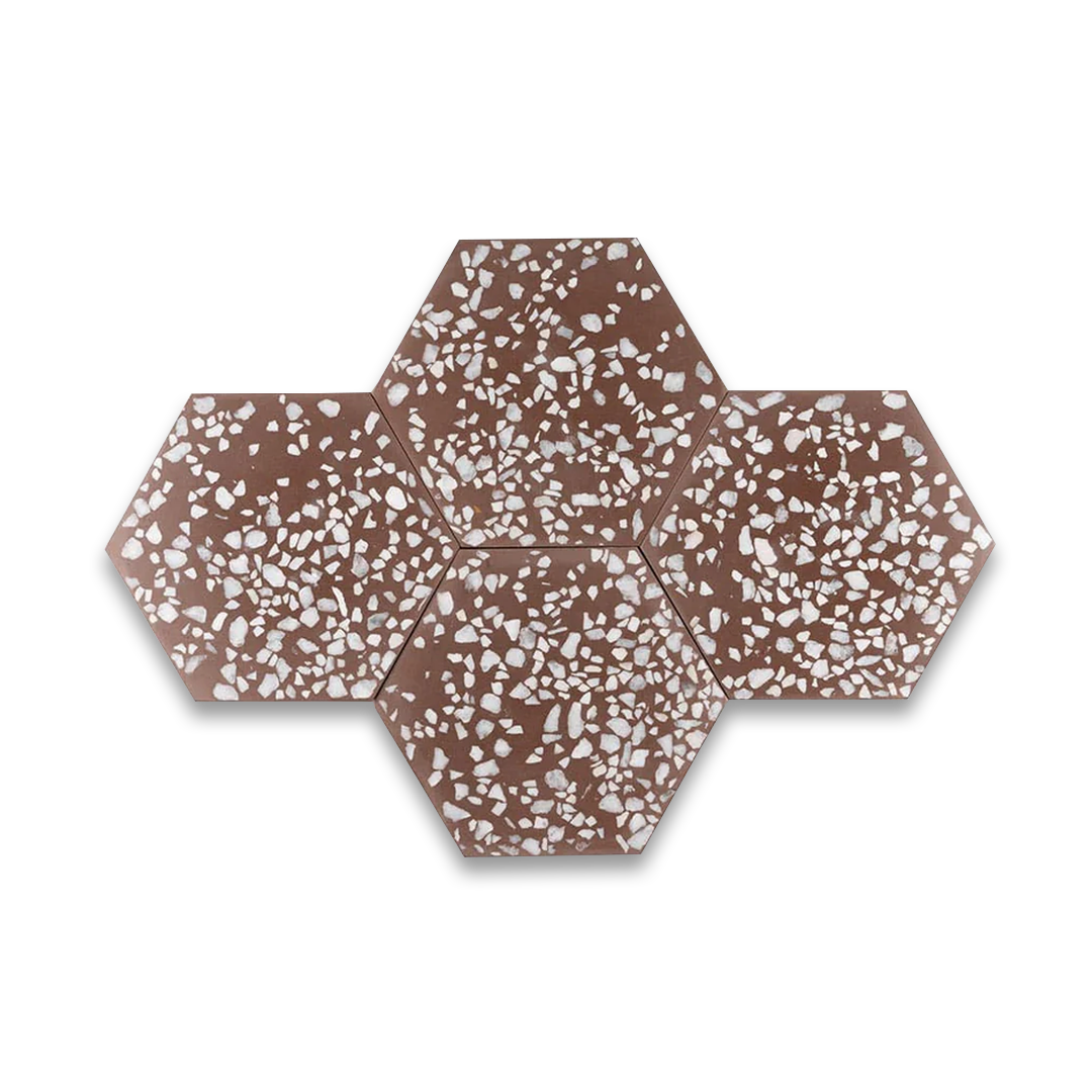 A set of hexagonal cement tiles featuring a rich brown base with scattered white terrazzo stone chips, creating a bold, modern, and textured geometric design.