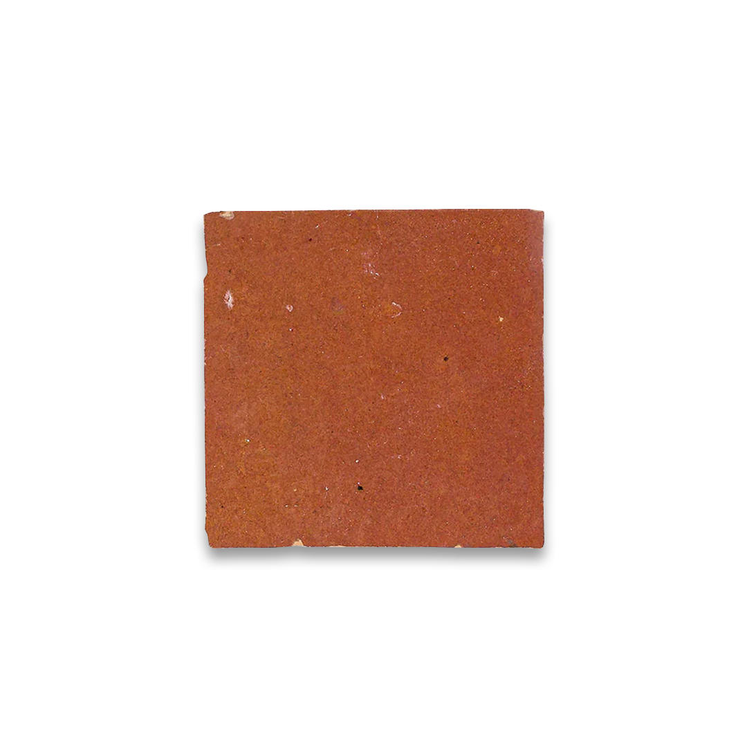 Square piece of brown sandpaper on a white background