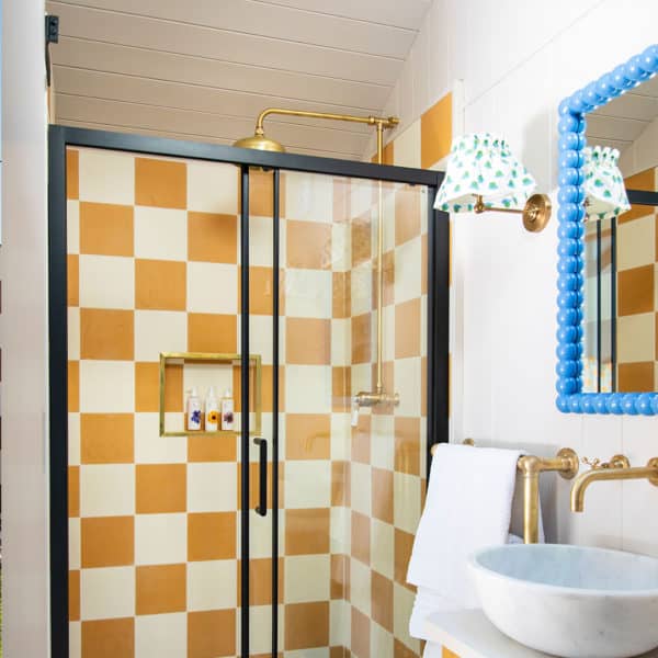 Mustard cement tiles shower cubicle