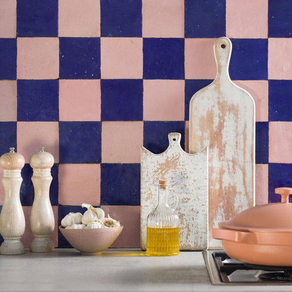 dark blue and dusty pink zellige checkerboard tiles kitchen splashback
